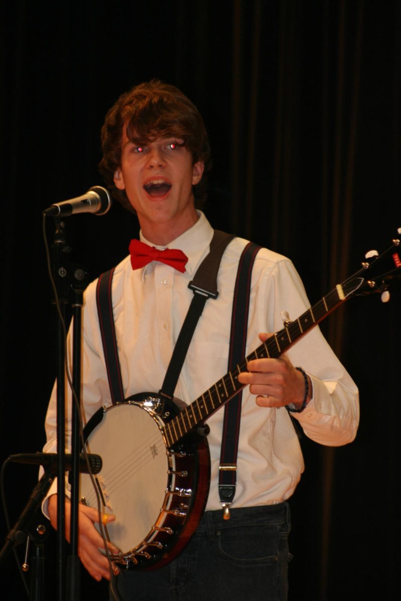 Dallastown Battle of the Bands contestant playing the Banjo.