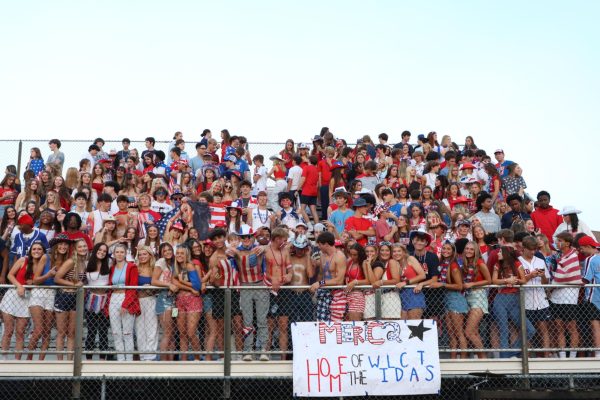 Northeastern game with USA student section theme.