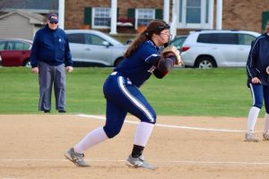 Zoe Roland begins her wind up for the strike-out pitch.