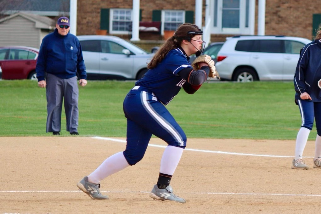 Zoe Roland begins her wind up for the strike-out pitch.