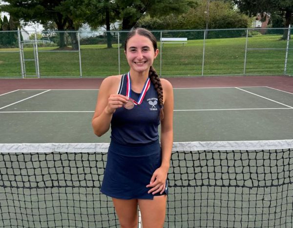 Elizabeth Tony holding her third place medal from counties. (Dallastown girls tennis)