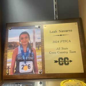 Navarro's plaque is kept in the back gym lobby. The plaque reads "2024 PTFCA All State".