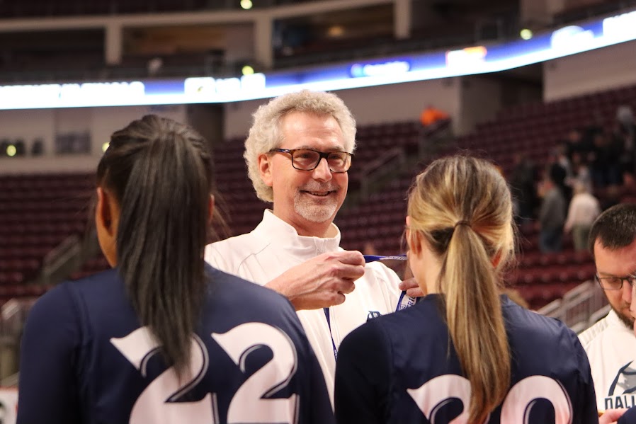 After winning the District 3 Finals for the first time in Dallastown history, Jay Rexroth presents his players with the gold metals in the Hershey Giant's Center. They later went on to win the first round of states, then played the second round and lost.