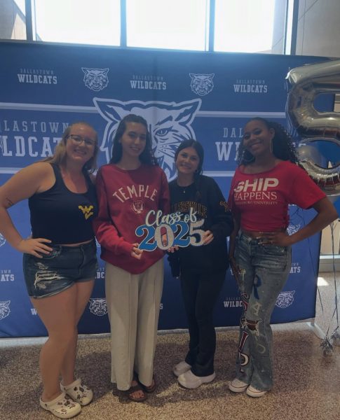 Dallastown Seniors Abby Kusmierski,
Julie Cioffi, Jade Bradenbaugh, and Saniyah Grant are showcasing their new school spirit by wearing their college apparel. 