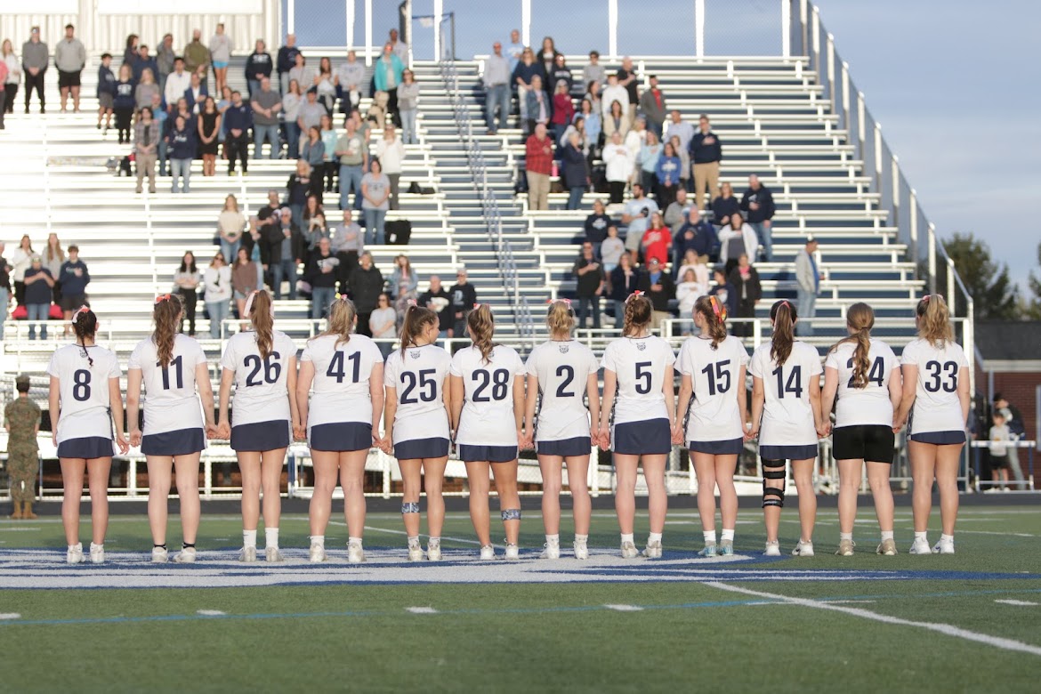 Girls lacrosse seniors all starting the game on senior night. They are the most winningest girls lacrosse class. 