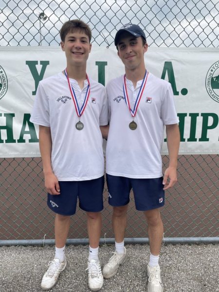 Seniors, Jacob Horn (left) and Hayden Koons (right) smile as they got first and second place at the YAIAA singles tournament. (Dallastown Athletics)