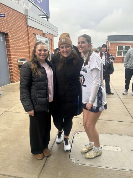 Math teacher Miss Sweitzer (center) poses with students Akira Sorrell (left) and Emily Stock (right) at a girls lacrosse game this spring. Sweitzer is finishing up her first year at DHS where she has also gotten involved with Mini-THON and coaching lacrosse. Photo submitted. 