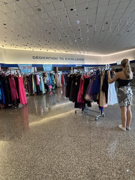 Students from all over York County shop on the Sept. 7 date of the Mini-THON Dress Sale. Shoppers have the opportunity to try on many dresses of various colors, styles, and sizes. (Riley Danielowski)