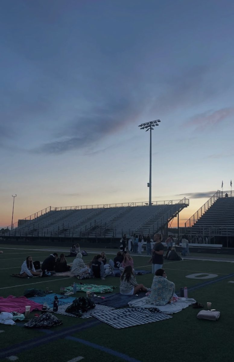 The Class of 2026 celebrated senior sunrise on Aug. 29 at the American Legion Field at Wildcat Stadium. Seniors ate donuts and talked with friends while watching the sun rise; signaling the beginning of their senior year. (Tysiar Bordonada)