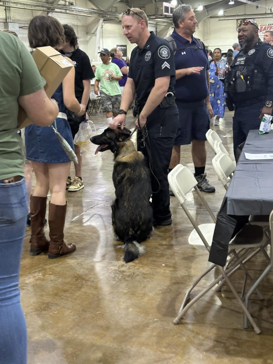 Corperal Jesse Harden and his K-9 Wero at the Spaghetti Dinner fundraiser. 