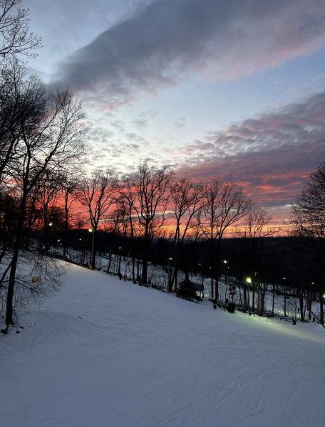 The sun sets at Ski Roundtop along the snowy mountains . Dallastown students fly down the slopes on their skis and snowboards. (Photo submitted)