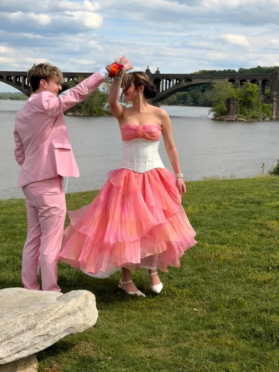 Junior Brooke Landis (right) altered her own dress. She's a very crafty individual and was able to save money using that skill.